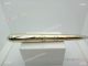 Santos de Cartier Pens - Yellow Gold Ballpoint Pen (7)_th.jpg